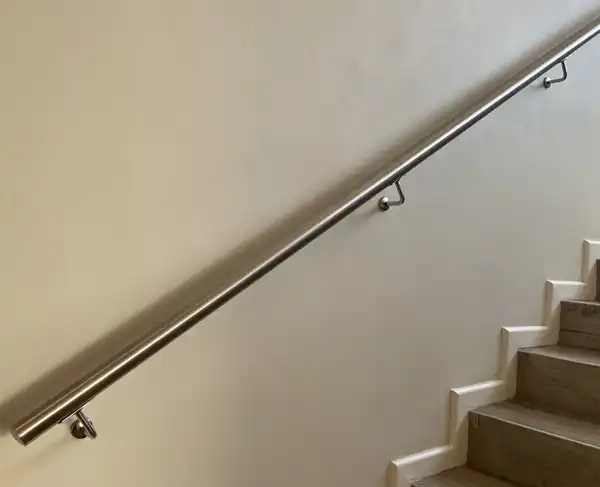 stainless steel handrail on wall