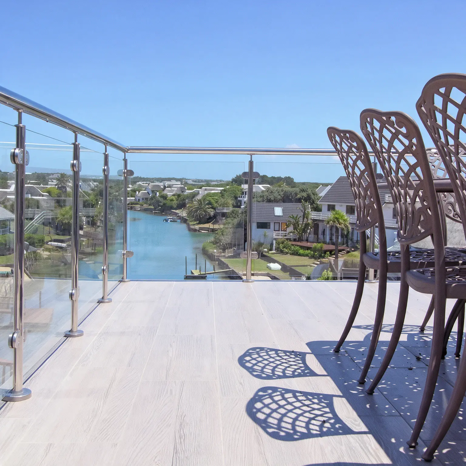 Glass pressure bracket balustrade - 316 polished stainless steel