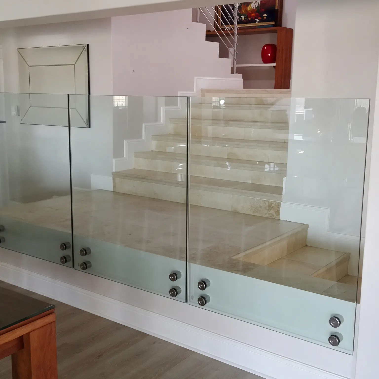 Glass stand-off balustrade in 304 brushed stainless steel