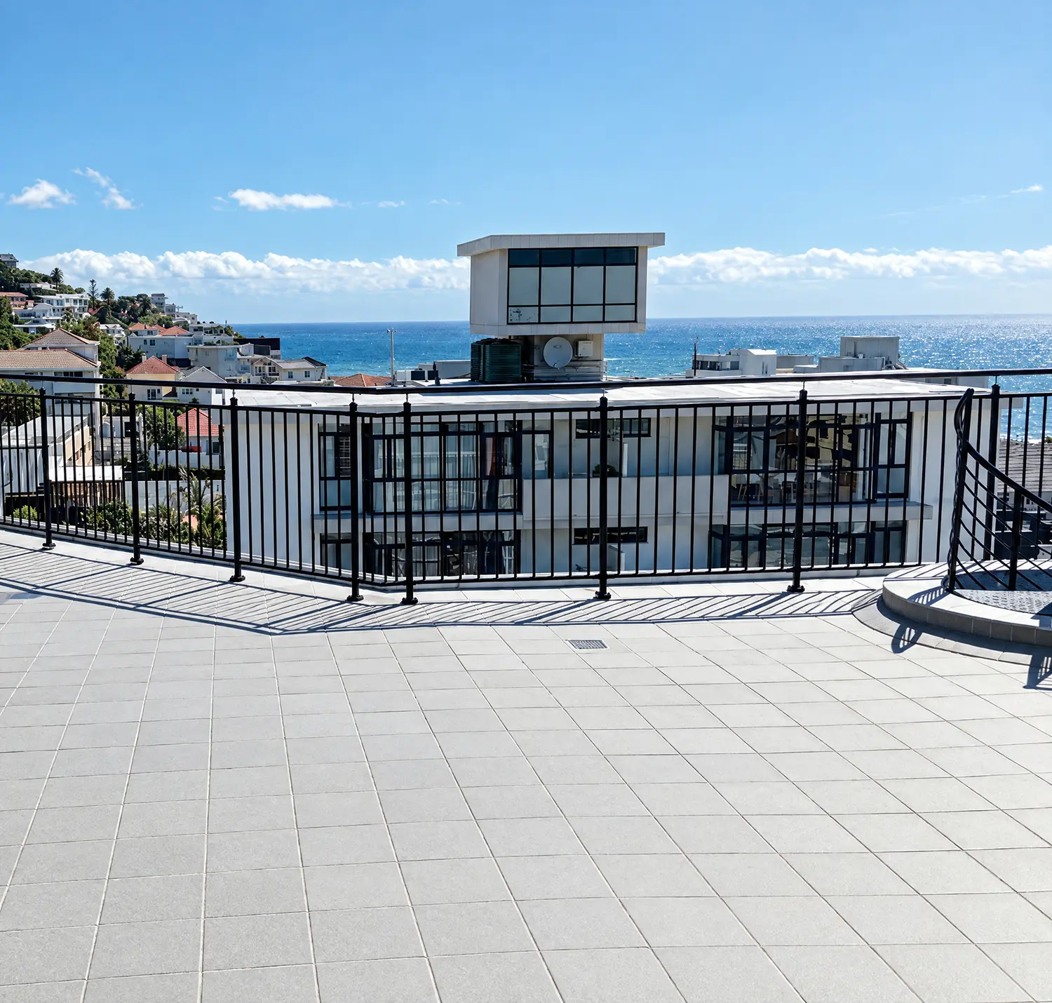 Vertical stainless steel filler bar balustrades on a terrace